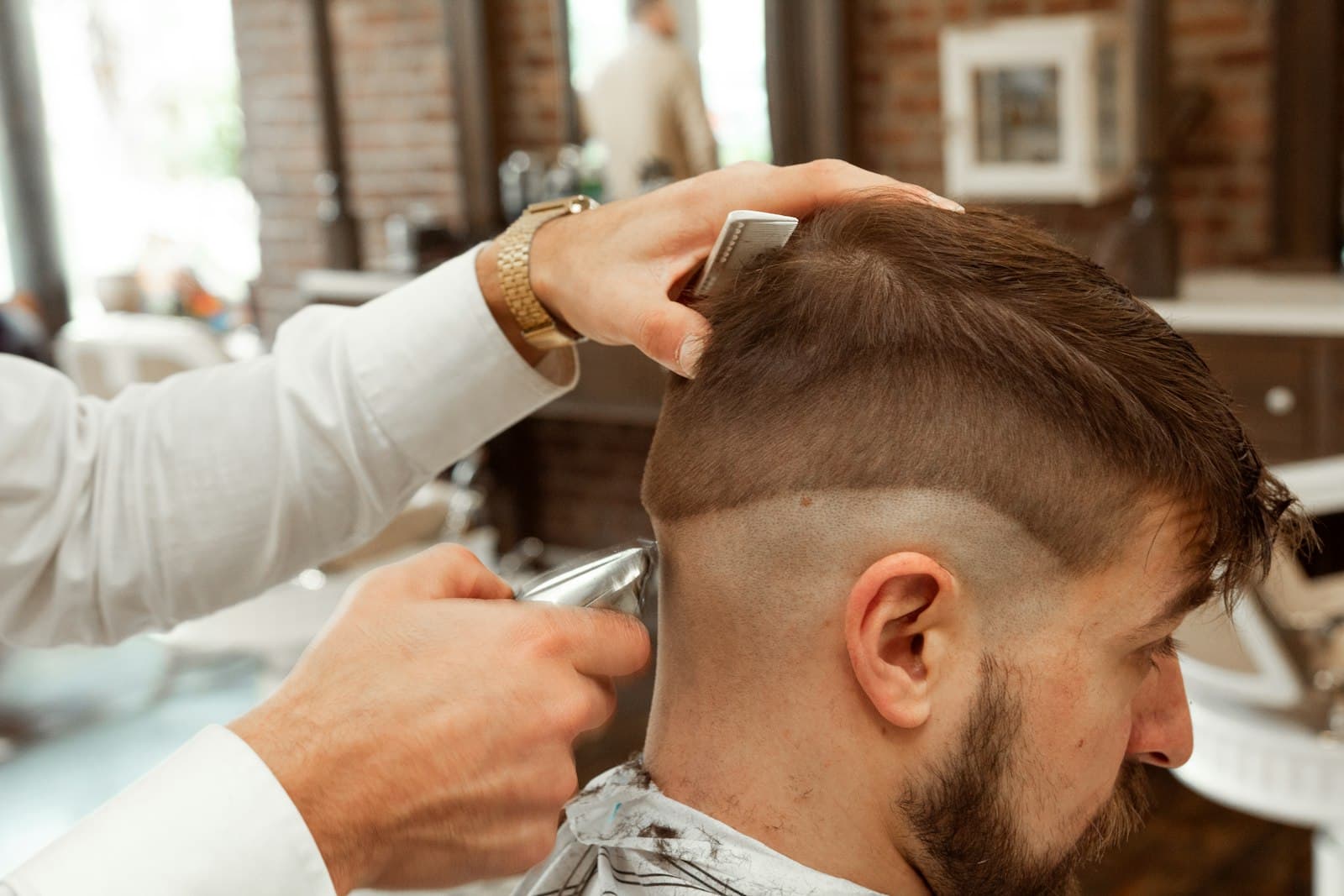 Clean fade haircut at Flexy De Barber